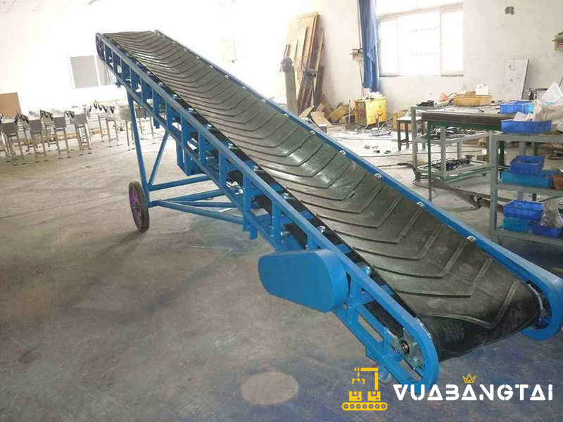 Băng chuyền nghiêng nâng hạ